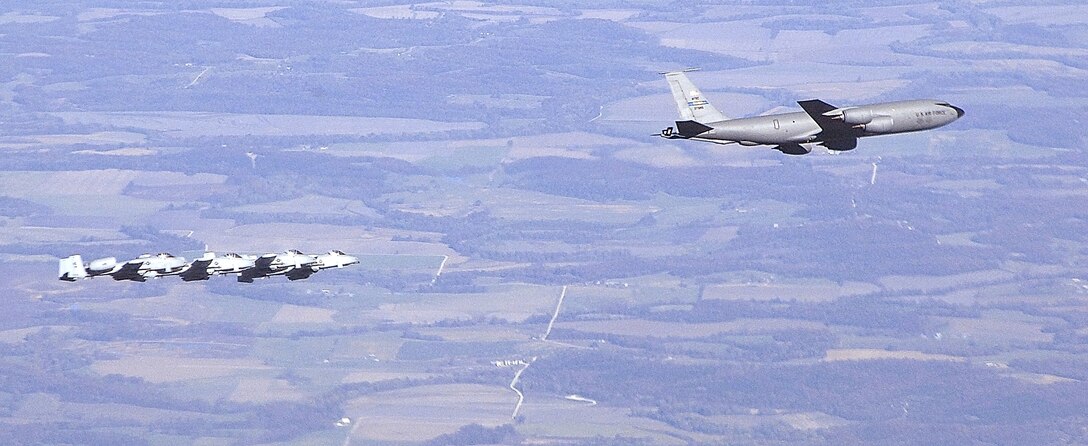 Four A-10 Thunderbolt IIs from the 442nd Fighter Wing, fly formation trailing a KC-135 Stratotanker during the  wing's Employer Appreciation Day, Nov. 3. Civilian employers of wing reservists were treated to a ride in two of the aerial tankers during the event. The 442nd FW is an Air Force Reserve unit at Whiteman AFB, Mo. (U.S. Air Force photo/Master Sgt. Bill Huntington)