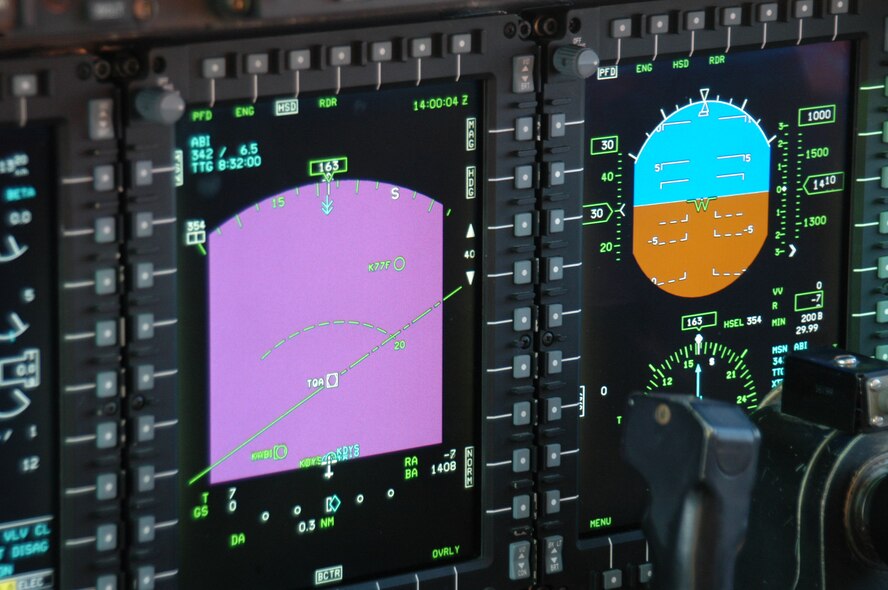 The 'all glass' cockpit allows aircrew to see digital displays instead of the older 1960s avionics technology.  It is one of the several changes the C-130 AMP program developed. (U.S. Air Force Photo by Senior Airman Joel Mease)
