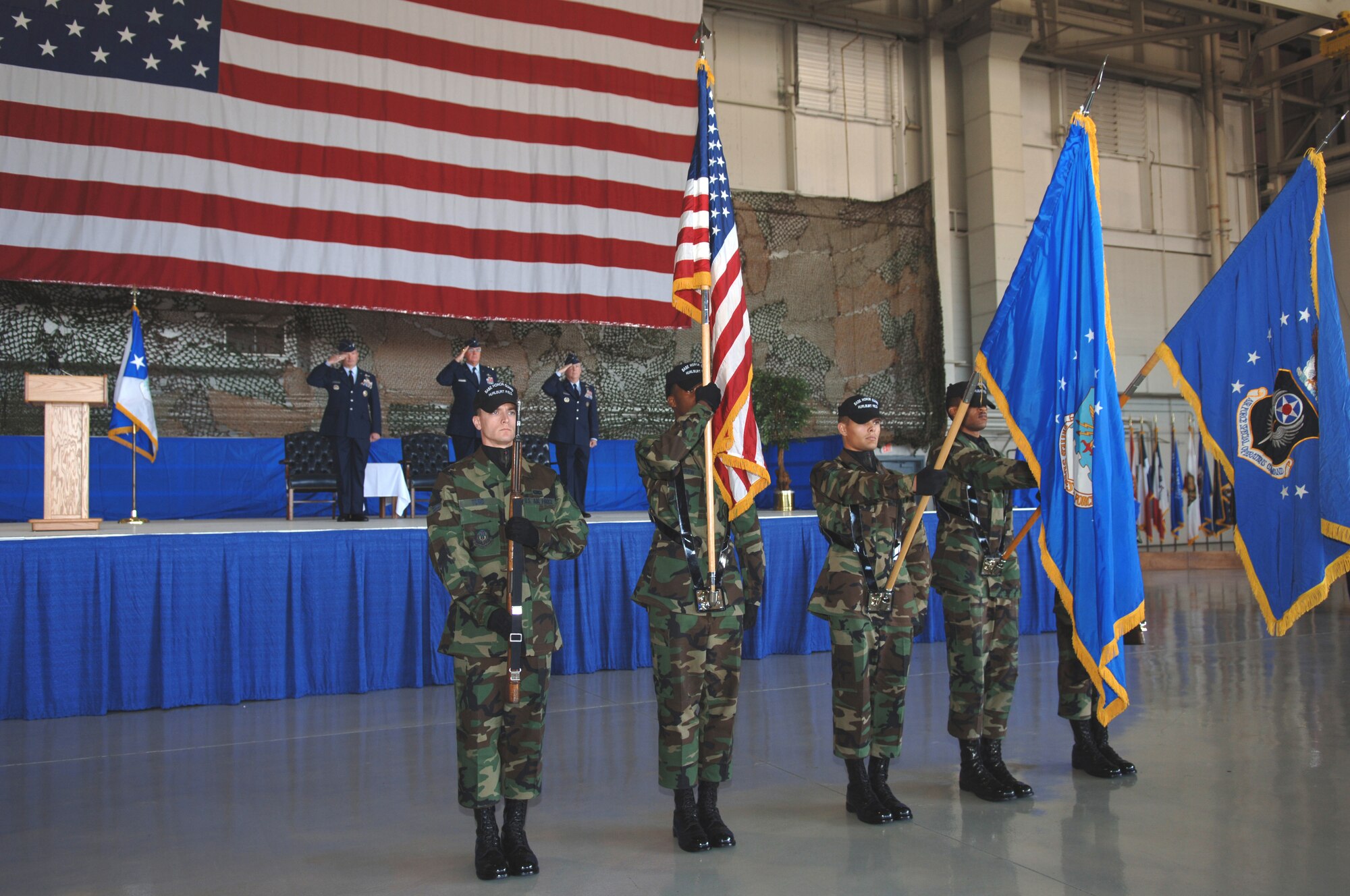 The Hurlburt Field Honor Guard presents the colors during the playing of the National Anthem at the Air Force Special Operations Command change of command ceremony Nov. 27 at Hurlburt Field, Fla. Lt. Gen. Donny Wurster assumed command of AFSOC from Lt. Gen. Mike Wooley during the ceremony attended by more than 1,000 Airmen and guests. (U.S. Air Force photo/Senior Airman Ali Flisek)