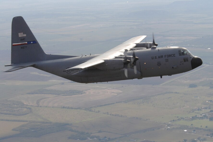 DYESS AIR FORCE BASE, Texas -- A Dyess C-130 Hercules flies a sortie above the Big Country Oct. 2007. This Nov. 19, the Air Mobility Command marked one million sorties flown since Sept. 11, 2001. The 317th Airlift Group, AMC's busiest C-130 unit and a tenant unit at Dyess AFB, has flown 36,217 sorties in support of Operations Iraqi and Enduring Freedom since 9/11. The group has  flown countless more sorties in support of deployments in the Horn of Africa, Southwest Asia, and all around the world.  (U.S. Air Force photo by Senior Airman Courtney Garrard)
