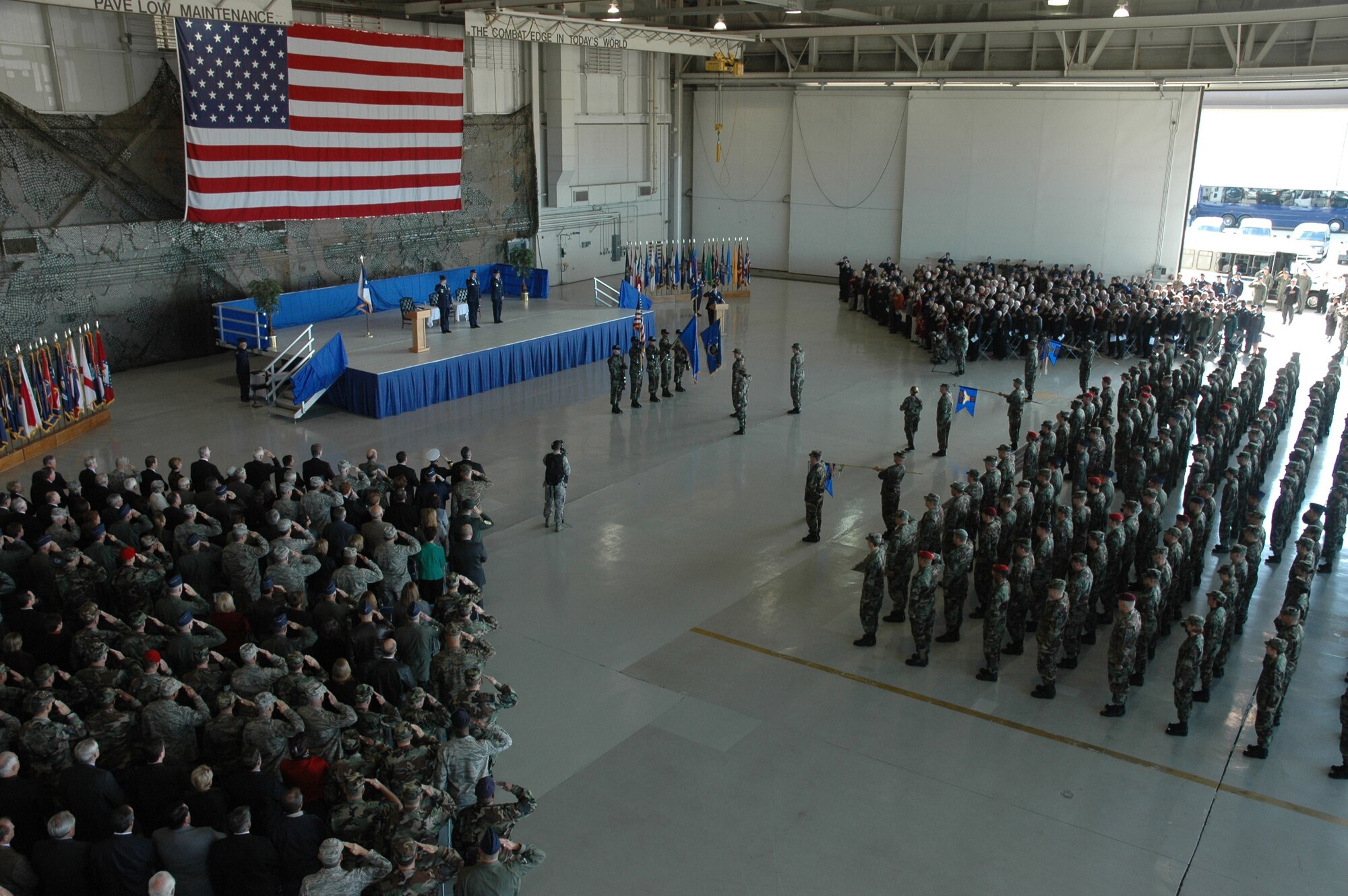 More than 1,000 Airmen and guests salute during the playing of the National Anthem at the Air Force Special Operations Command change of command ceremony Nov. 27 at Hurlburt Field, Fla. Lt. Gen. Donny Wurster assumed command of AFSOC from Lt. Gen. Mike Wooley during the ceremony. (U.S. Air Force photo/Senior Master Sgt. Tom Wood)