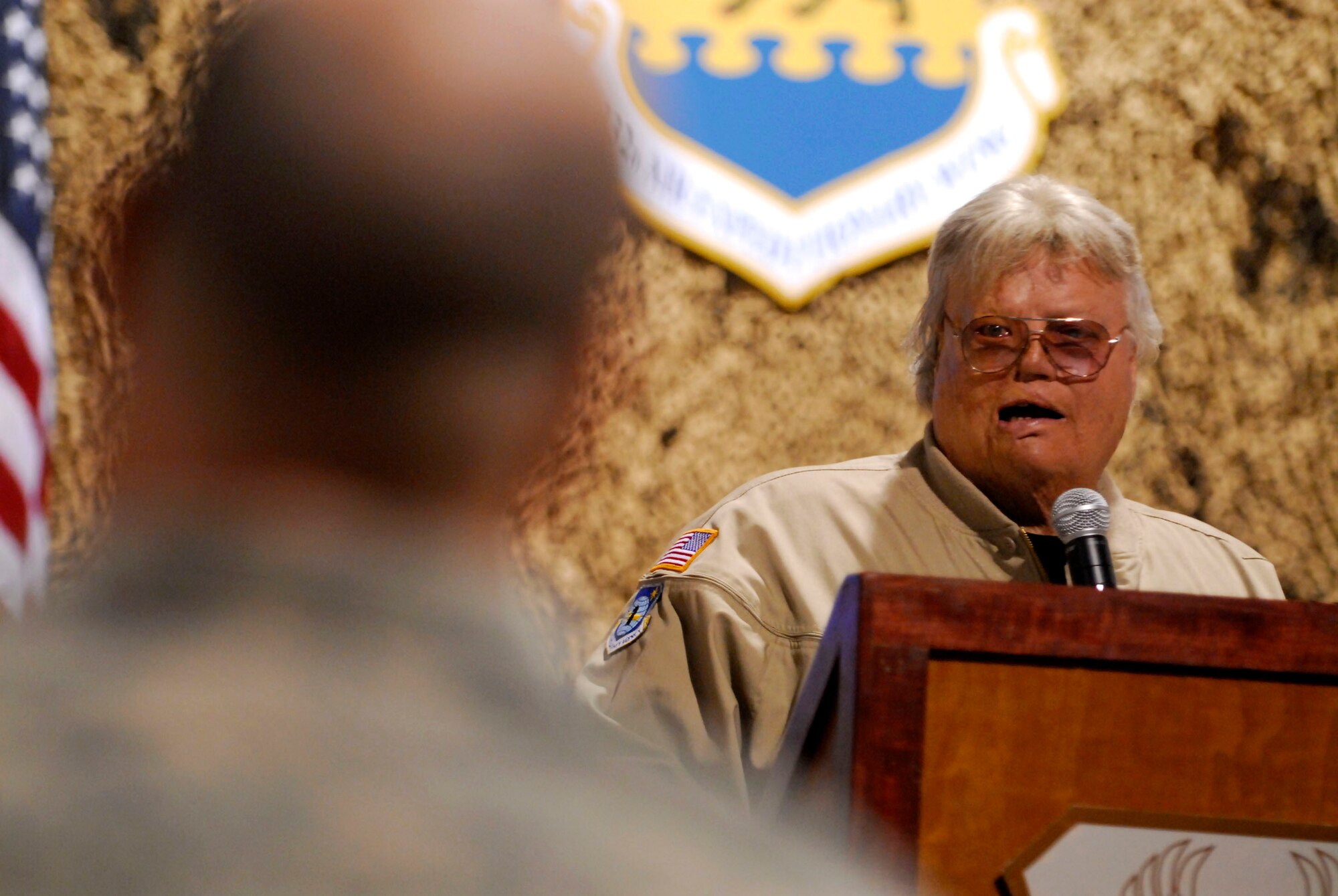 Dave Roever shares his personal experiences about overcoming adversity following severe injuries from a phosphorous grenade with Airmen and Soldiers Nov. 26 at Balad Air Base, Iraq. Mr. Roever, a disabled Vietnam War, veteran told military members he understands the difficulties they face serving in a time of war and extended the support of the American people. (U.S. Air Force photo/Staff Sgt. Joshua Garcia) 
