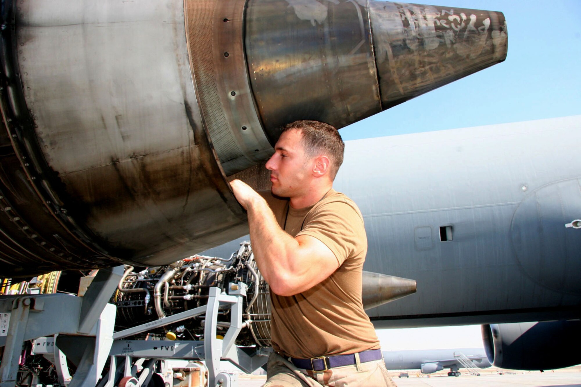 Staff Sgt. Jamie Sherwood inspects the turbine blades of a damaged engine removed from a KC-10 Extender Nov. 23 at a deployed air base in Southwest Asia.  The engine will be sent to a depot where it will be overhauled and returned to the unit. (U.S. Air Force photo/Master Sgt. Ruby Zarzyczny) 