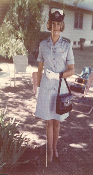 New Airman Kristina McManus shows off her uniform at a family gathering in 1969.  She recently retired as a Chief with the 932nd Airlift Wing, an Air Force Reserve Command unit at Scott AFB.
