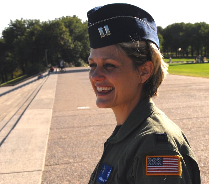 EDITORIAL:  The St. Louis Arch is one of the
greatest tourist attractions this side of the
Mississippi. However, this is where it
all happened. 

Where my soul touched the ground and my heart opened. It was
here...at the St. Louis Arch, that I found
my purpose.

It began with our group exiting the
big blue Air Force tour bus during a recent Junior Officer Leadership Development course.

Everyone made their way down the concrete path
toward the big and magnificent Arch.
For all the folks that attended JOLDs
from other states, this was a site to behold,
but for me it started out to be just
another day at the St. Louis Arch.
I made my way to the entrance
and walked down the
well-maintained ramp into the
south side of the museum. Myself
and a lieutenant from Massachusetts,
stood there waiting for
our site-seeing group to catch up.

As we stood there, the cutest,
most adorable little boy came
up to us with his little brother and
grandfather. He couldn’t have
been any older than four or five
and his little brother was probably
a year behind him. He and his
brother wore matching red shirts
with shorts. His big brown eyes
matched his hair color. He smiled
joyfully and said, “Excoooz me,
Excoooz me, I would like to say
thank you for serving our country.”

As a mother, I thought how
adorable and respectful. The lieutenant
and I both smiled and said,
“Thank you!” But within a second’s
notice…you know how unpredictable
children can be, this precious little boy
said, “Did you hear about my Daddy?”
My heart sunk. I could no longer breath.

“It is all I could think
to say. I felt small
and insignificant. I
felt like I should be
thanking him for his
sacrifice.”

It was like watching a scary movie
where you know what was about to happen
but you can’t stop it. I turned to
that little boy, looked into his eyes and
said, “No, what happened to him?” With
all the excitement of rehashing an amazing
adventure that little boy sai