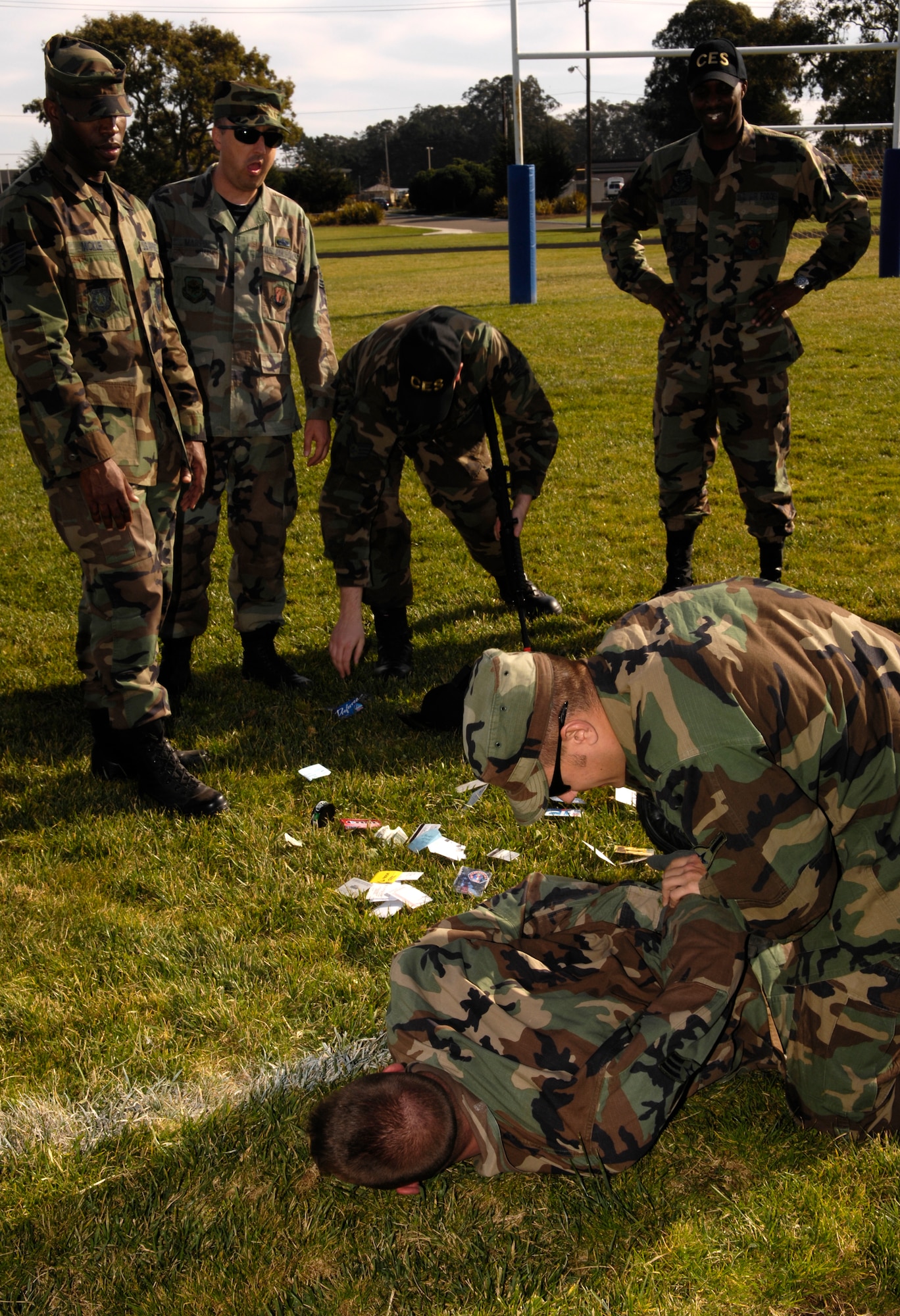 VANDENBERG AIR FORCE BASE, Calif. -- During practice searches and takedowns, cadre instruct Airmen on proper procedures during Combat Airman Training in Cocheo Park on Nov. 28. Combat Airmen Training was created to help Airmen become more effective warriors during the Air Force's transition toward both an air and ground force. Airmen support other military branches on ground assaults against terrorists the world over, which makes additional training an invaluable asset. (U.S. Air Force photo/Airman 1st Class Christian Thomas)