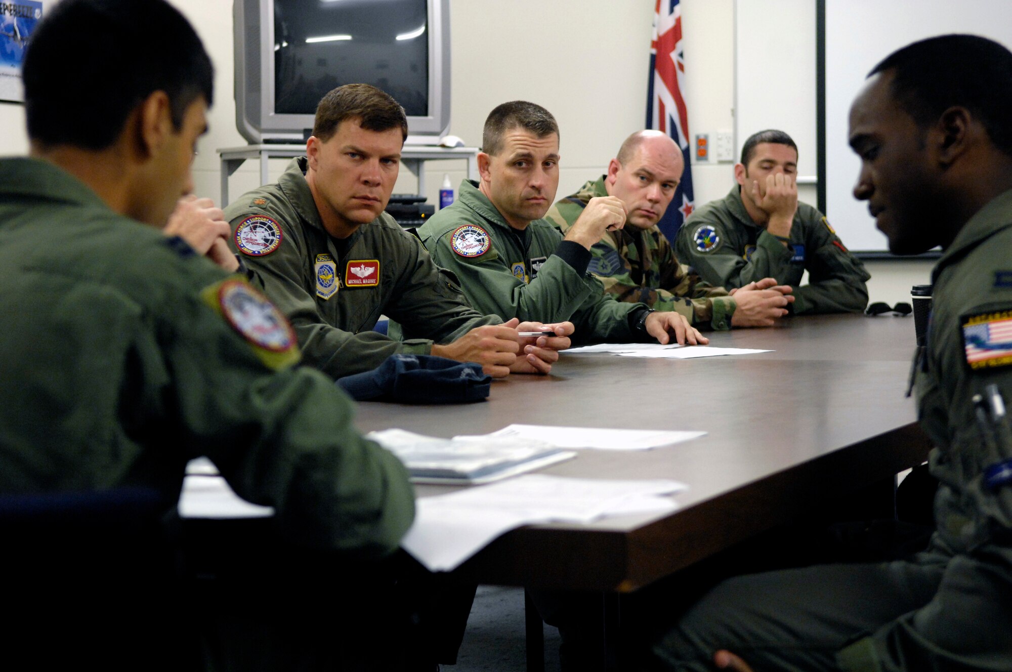 C-17 crewmembers conduct a pre-flight briefing prior to taking off for an Operation Deep Freeze mission Nov. 26, 2007 from Christchurch, New Zealand. Reserve and active duty Airmen from McChord Air Force Base, Wash. are at Christchurch supporting the 13th Air Force-led Joint Task Force Support Forces Antarctica, Operation Deep Freeze. Operation Deep Freeze is a unique joint and total force mission that has supported the National Science Foundation and U.S. Antarctic Program that began in 1955. (U.S. Air Force photo/Tech. Sgt. Shane A. Cuomo)