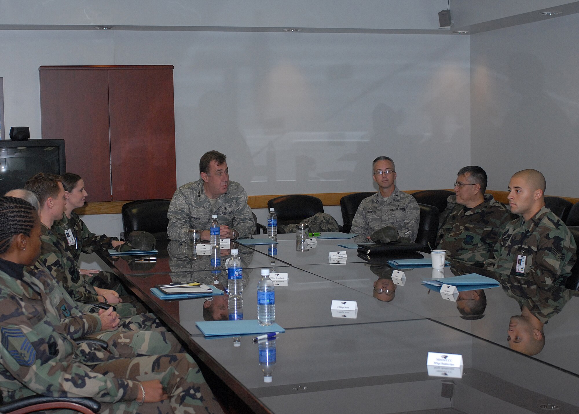 KUNSAN AIR BASE, South Korea --Major General Gar Graham, Assistant Surgeon General for Dental Services, talks with Airmen from the dental clinic about the changes in the Air Force and answer their questions Nov. 29 here.  During the general's one day visit he thanked medical technicians for ensuring the health and wellness of Airmen along with their service to the nation and answered their questions during an all-hands call. (U.S. Air Force photo/Senior Airman Giang Nguyen)