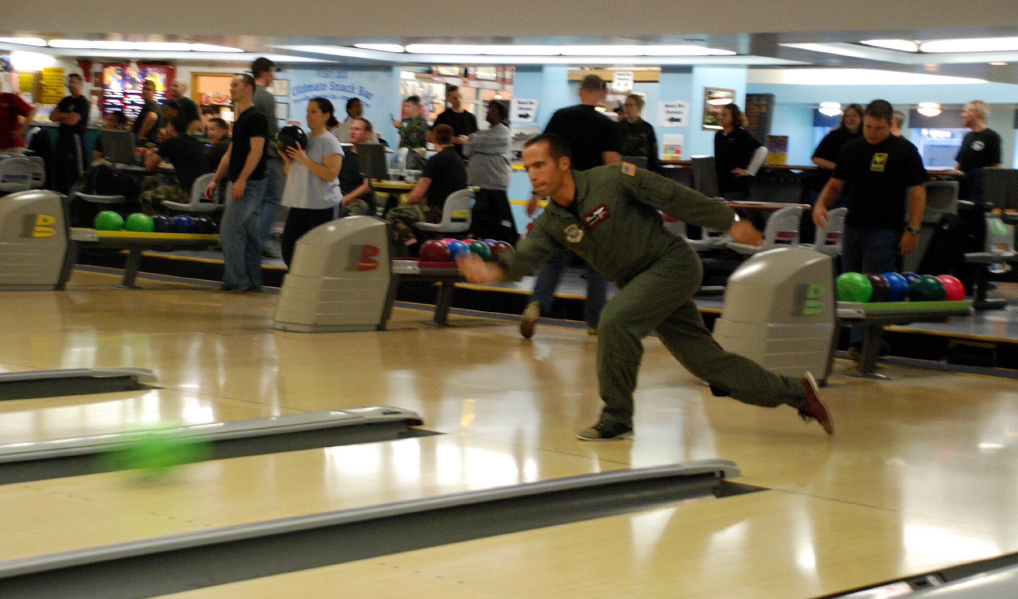 Maj. Mike Brazelton, 305th Air Mobility Wing Combined Federal Campaign representative, participates during the CFC bowl-a-thon to help raise money for the campaign here Nov. 29. The wing’s CFC goal of 100 percent contact has been met; donations will be accepted through Dec. 13. The next CFC event will be Dec. 9 at the Eagles/Giants game. For more information or to get involved, contact your unit CFC representative or call Major Brazelton at (609) 754-4503. (U.S. Air Force photo/Airman 1st Class Rebekah Phy)