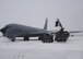 KC-135 Stratotanker gets prepared for an exercise mission by a deicer on the flight line at Grand Forks Air Force Base, North Dakota on November 28, 2007. The base is undergoing a strategic exercise in the -12 degree weather, -20 degree wind chill, a typical North Dakota day in the winter months. (U.S. Air Force photo/Senior Airman Chad M. Kellum)(Released)