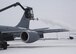 KC-135 Stratotanker gets prepared for an exercise mission by a deicer on the flight line at Grand Forks Air Force Base, North Dakota on November 28, 2007. The base is undergoing a strategic exercise in the -12 degree weather, -20 degree wind chill, a typical North Dakota day in the winter months. (U.S. Air Force photo by Senior Airman Chad M. Kellum)