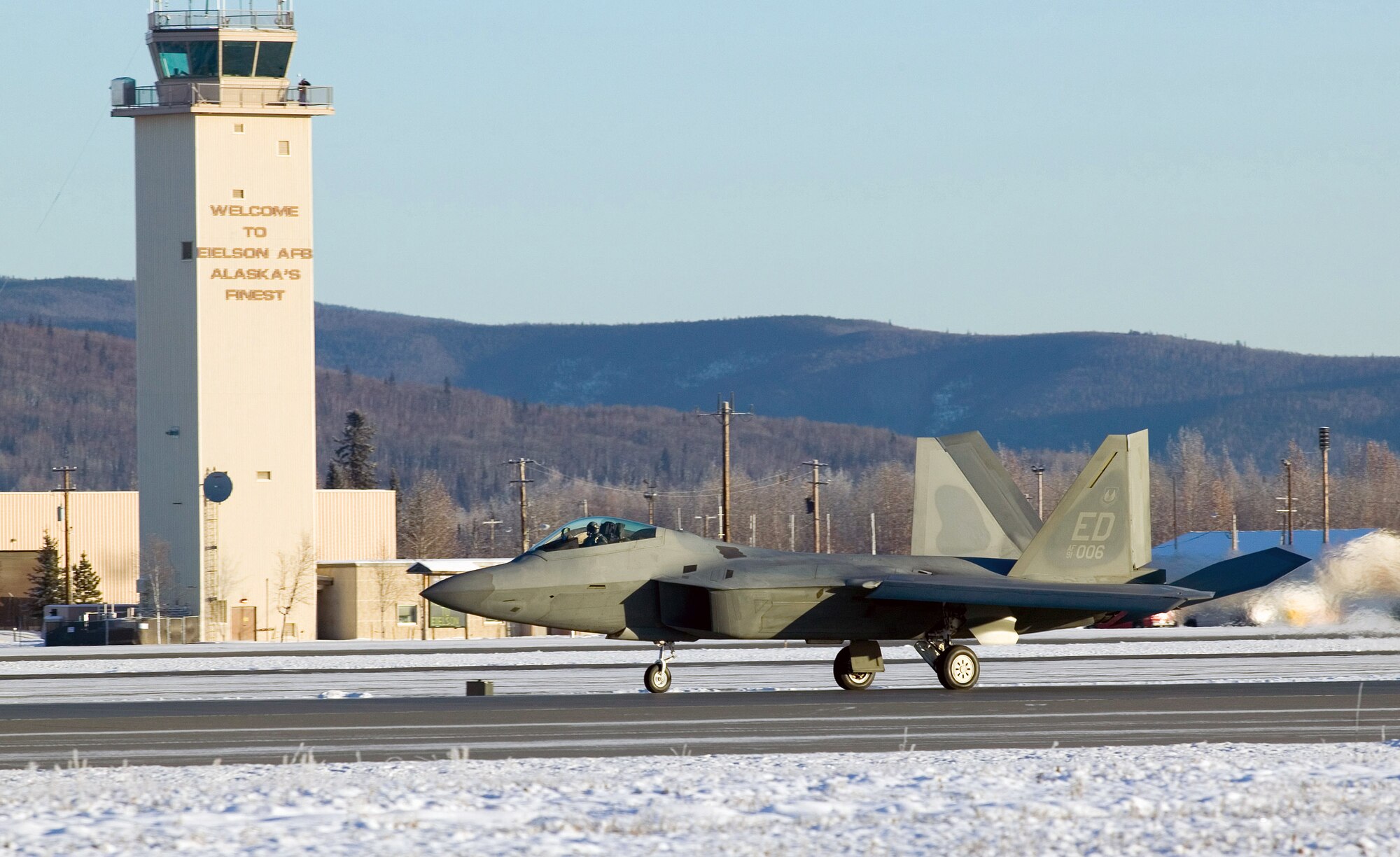 An F-22 Raptor comes to a stop Nov. 5 on the runway at Eielson Air Force Base, Alaska. The F-22 underwent cold-weather testing on its braking system, with emphasis on its ability to maneuver, stop and go on slippery surfaces. The aircraft was tested by the 411th Flight Test Squadron during a three-week deployment on incrementally low-level runway condition reading surfaces, with temperatures ranging between 37 to -13 degrees. The F-22 is from Edwards AFB, Calif. (U.S. Air Force photo/Kevin Roberston) 
