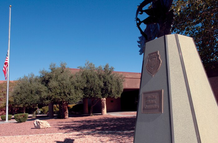 Building 282 at Nellis AFB, Nev., serves as headquarters for the U.S. Air Force Weapons School.  Nine of the 16 weapons squadrons are located at Nellis, including the F-15, F-16, A-10, and upon completion of current facility maintenance, the F/A-22 Raptor. (U.S. Air Force photo by Senior Airman Larry Reid Jr.)
