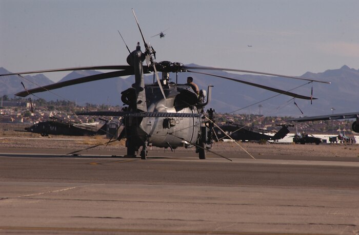 An HH-60G Pave Hawk sits on the Nellis flightline. On average, the 66th Rescue Squadron flies 20 missions each week to practice different operations the crewmembers are expected to use while deployed in support of the Global War on Terror. (U.S. Air Force photo by Staff Sgt. Jacob R. McCarthy)