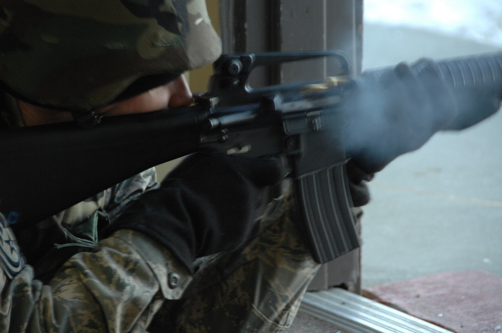 EIELSON AIR FORCE BASE, Alaska -- Tech. Sgt. Jamie Brown, 354th Aircraft Maintenance Squadron section chief, fires his M16 down range Nov. 29, 2007 at the small arms firing range. Eielson's small arms range trains roughly more than 1,900 people with the M16 and M4 rifles and M9 pistol per year, the range is still capable of qualifying Airmen for firearms in arctic temperatures, going as low as negative 40 degrees.  (U.S. Air Force photo by Airman 1st Class Christopher Griffin)