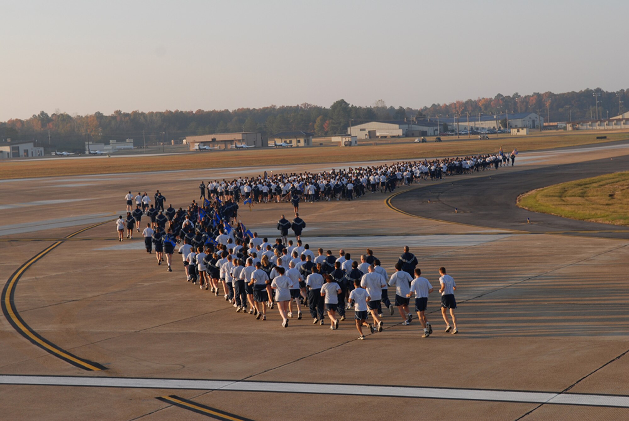 BLAZE Team members ran a two mile Warrior Run in formation to jump start the Wingman Day activities. The event provided team building skills to each of the units. (U.S. Air Force photo by Airman 1st Class Danielle Powell)