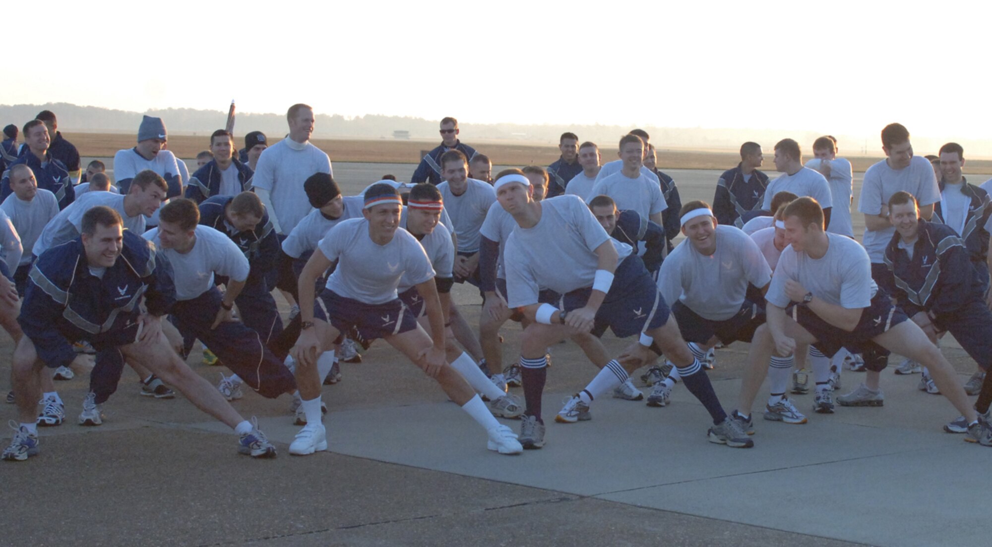 Members of the 41st Flying Training Squadron stretch before the Warrior Run Nov. 20. (U.S. Air Force photo by Airman 1st Class Danielle Powell)