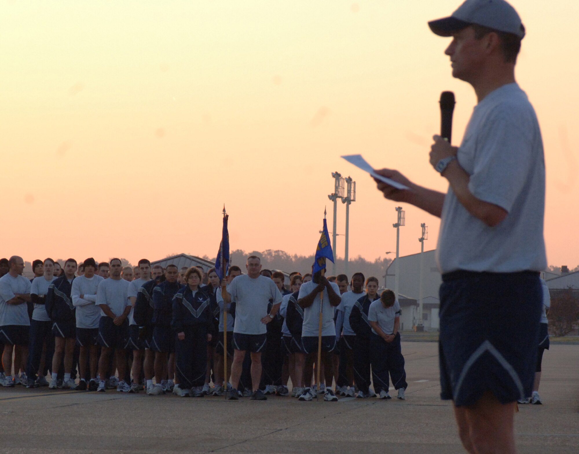 Members of the 14th Medical Group lisen on as the 14th Flying Training Wing commander, Col. Dave Gerber, delivers his Commander's Call address Nov. 20 to kick off  the Wingman Day activities. (U.S. Air Force photo by Airman 1st Class Danielle Powell)