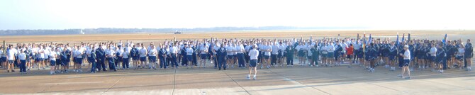 The BLAZE Team came together following the Warrior Run Nov. 20 to sing the Air Force Song. Participants ran a two mile path on the flightline. (U.S. Air Force photo by Airman 1st Class Danielle Powell)