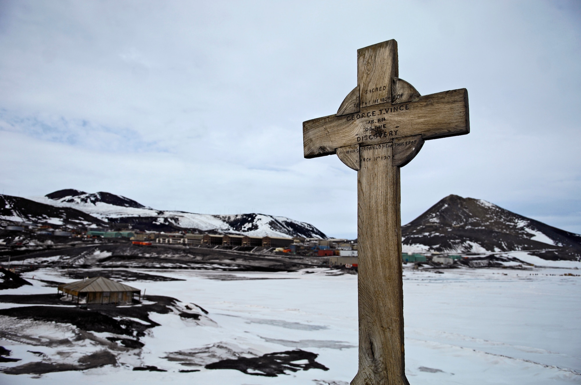 A cross monument over looks the annual sea ice runway near McMurdo Station, Antarctica Nov. 26, 2007. The cross is an historic monument commemorating T. Vince of the British Antarctic Expedition of 1901-1904 who lost his life in the vicinity in March 1902. McMurdo Station is the largest community in Antarctica and a science research center operated by the United States through the United States Antarctic Program a branch of the National Science Foundation. The ice runway is used by C-17 Globemaster III and LC-130 Hercules aircraft as part of the 13th Air Force-led Joint Task Force Support Forces Antarctica, Operation Deep Freeze (U.S. Air Force photo/Tech. Sgt. Shane A. Cuomo) 