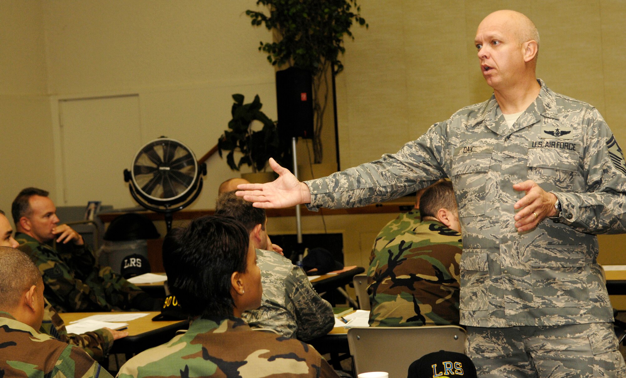 VANDENBERG AIR FORCE BASE, Calif. -- Senior Master Sgt. Greg Day, a instructor from the First Sergeant Academy located at Maxwell AFB, Ala., gives an inspections and searches briefing to students attending an additional duty first sergeant symposium on Nov. 16. Sergeant Day is a first sergeant and has been an instructor at the academy for two years. Students from many bases attended the week long course on behalf of the first sergeants council at Vandenberg to prepare them for additional duty first sergeant responsibilities, and ultimately their role as an enlisted leader. (U.S. Air Force photo/Airman 1st Class Christian Thomas)
