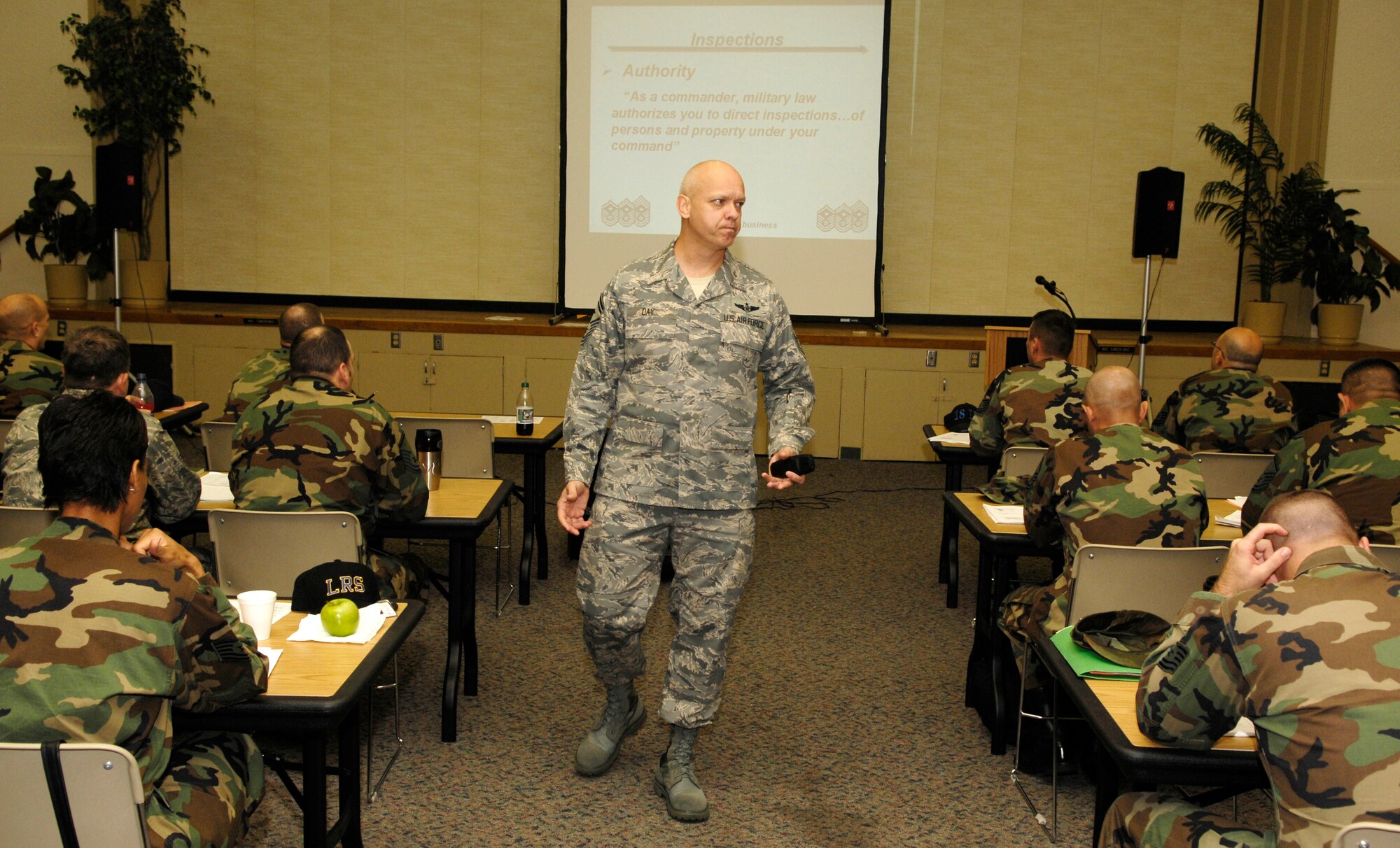 VANDENBERG AIR FORCE BASE, Calif. -- Senior Master Sgt. Greg Day, a instructor from the First Sergeant Academy located at Maxwell AFB, Ala., gives an inspections and searches briefing to students attending an additional duty first sergeant symposium on Nov. 16. Sergeant Day is a first sergeant and has been an instructor at the academy for two years. Students from many bases attended the week long course on behalf of the first sergeants council at Vandenberg to prepare them for additional duty first sergeant responsibilities, and ultimately their role as an enlisted leader. (U.S. Air Force photo/Airman 1st Class Christian Thomas)
