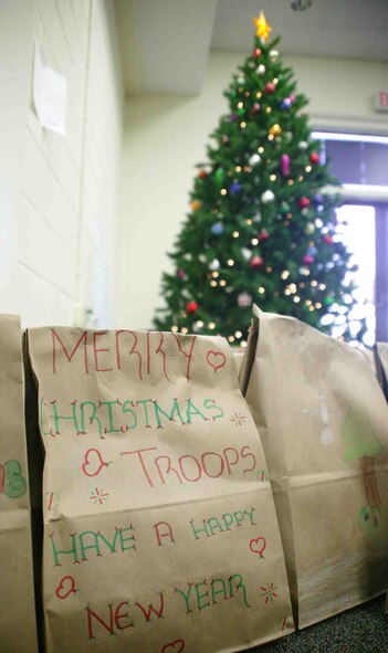 SHAW AIR FORCE BASE, S.C. --  Bags of cookies are displayed at the Community Activities Center during the Shaw Cookie Drive kickoff Nov. 30. The Airman's cookie drive, sponsored by the Enlisted Spouses Club and the Officer and Civilian Spouses Club, received more than 60,000 cookies this year from local community and base volunteers. The cookies are distributed to Airmen across Shaw and to deployed Airmen and Soldiers as well. (U.S. Air Force photo/Staff Sgt. John Gordinier)
