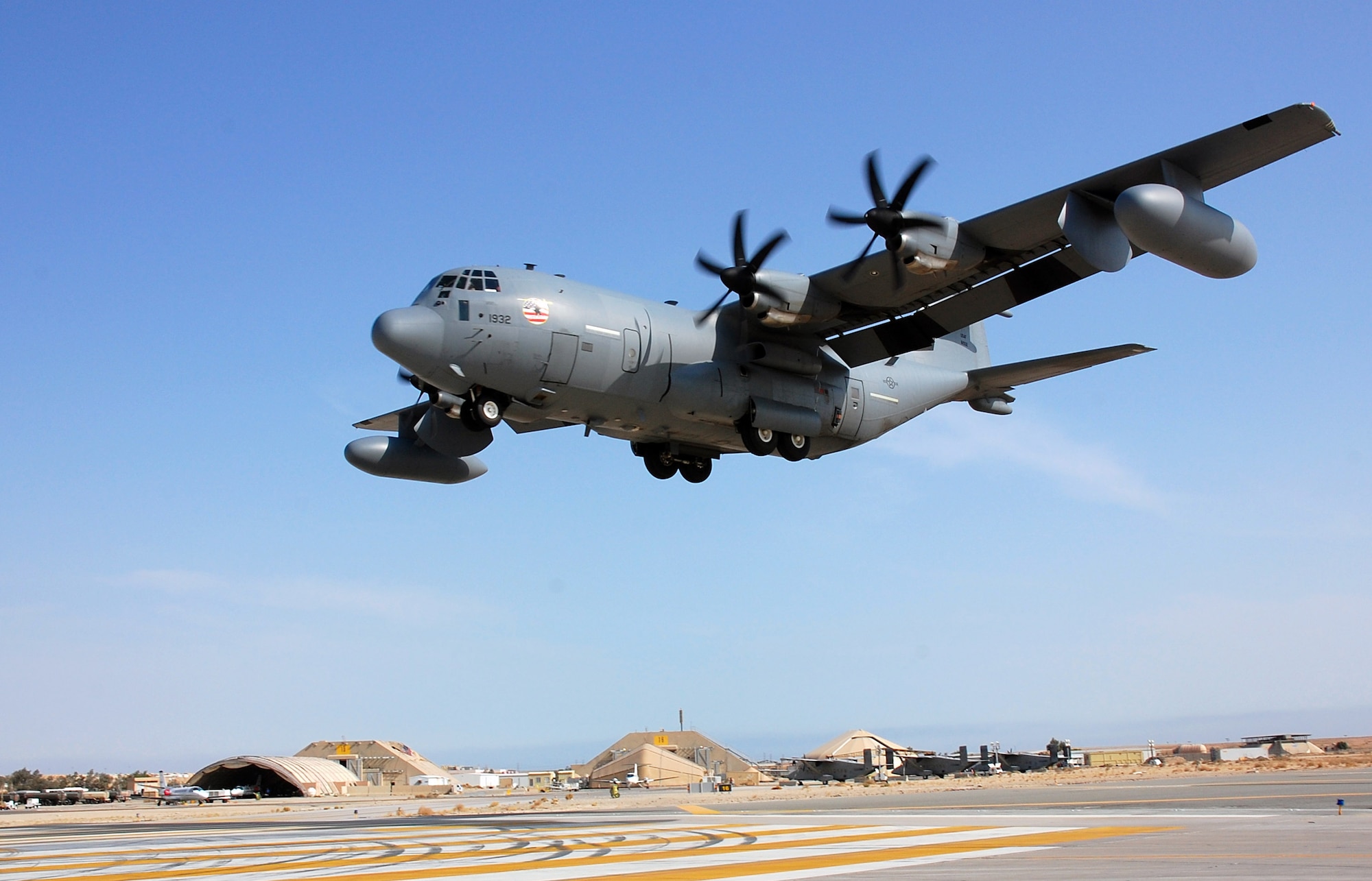 An EC-130J Commando Solo aircraft prepares to land at an air base in Southwest Asia. The EC-130J conducts information operations, psychological operations and civil affairs broadcasts in the AM, FM, HF, TV and military communications bands. (U.S. Air Force photo/Staff Sgt. Tia Schroeder)