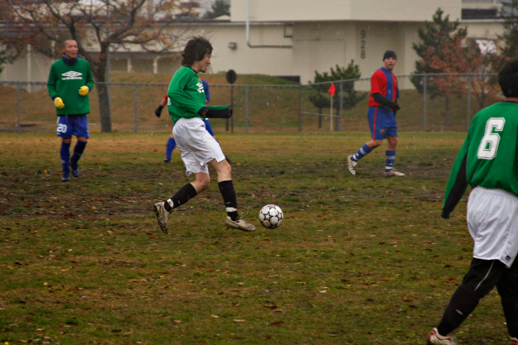 MISAWA AIR BASE, Japan -- Daisuke Ishikawa from the Misawa Dolphins moves the ball towards the goal in an exhibition match between the Dolpins and Misawa United on Nov 18, 2007. Misawa United is part of an off-base league that invited the Dolphins and another team, Misawa FC, for a few friendship games.
(US Air Force photo by Airman 1st Class Eric Harris)