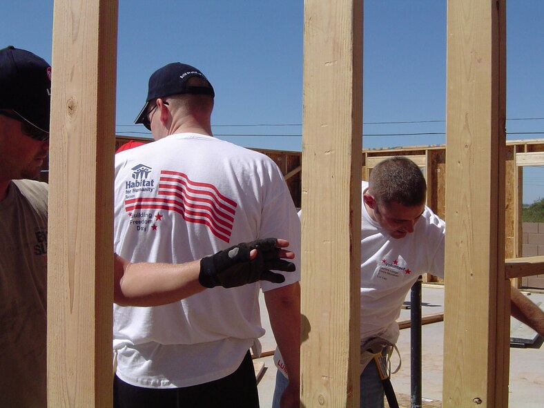Davis-Monthan Air Force Base supports Habitat for Humanity throughout the year. Each year Habitat for Humanity conducts a special build commemorating 9/11 - Building for Freedom Day. This year 40 D-M volunteers joined community volunteers on this very special day. Volunteers framed, enclosed and raised the roof trusses on seven homes. (Courtesy photo)