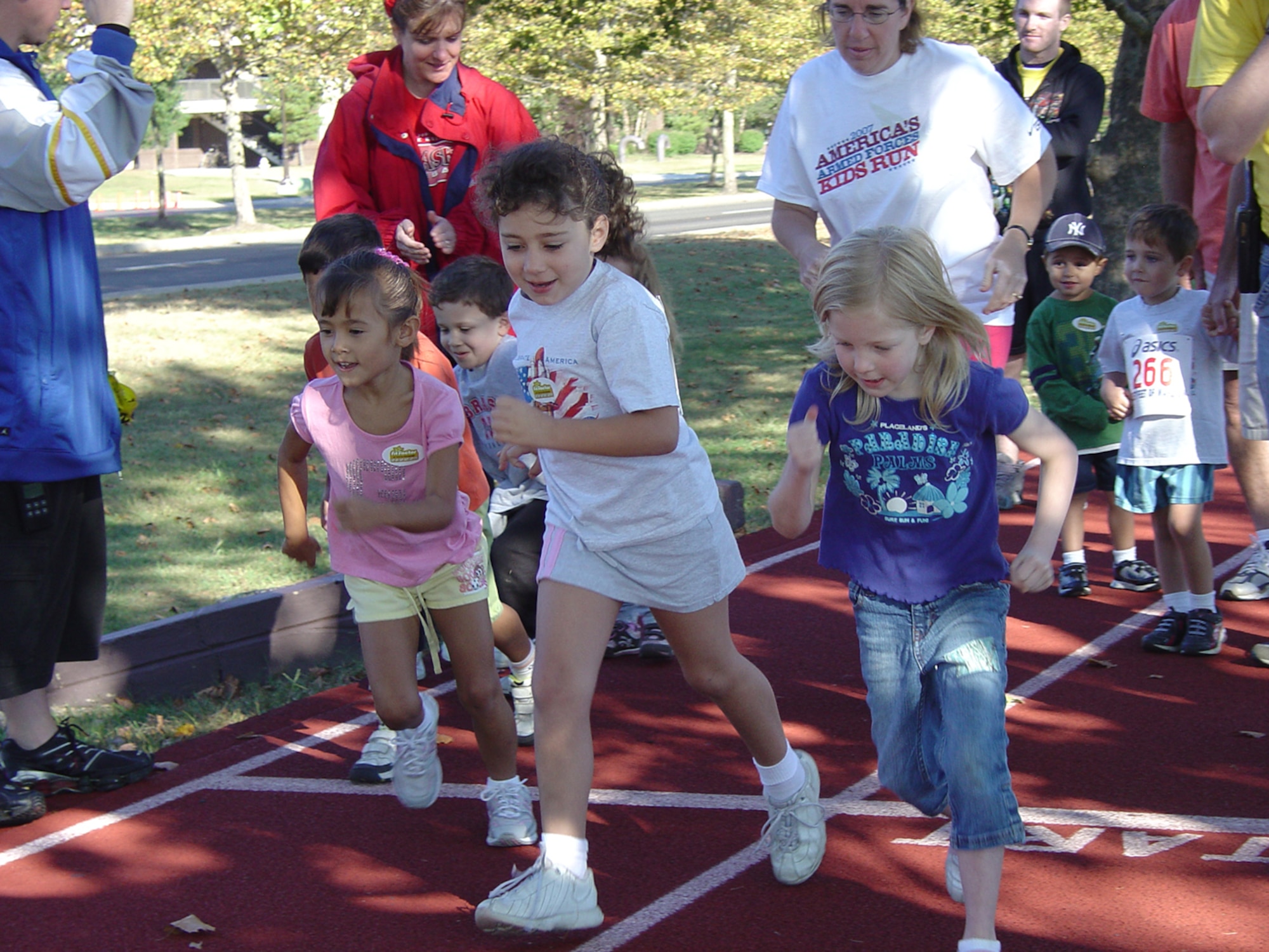 Children participants in the McGuire-Dix-Lakehurst Joint Base Race Kids Run begin their one-mile race around the fitness center track here Sept. 29. (U.S. Air Force photo/305th Services Squadron)