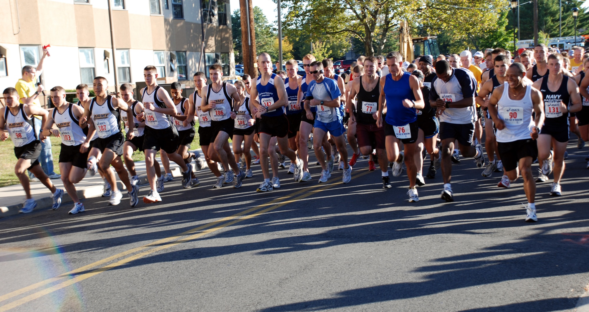 Participants in the McGuire-Dix-Lakehurst Joint Base Race half marathon (13.1 miles) begin the race after the sound of the fog horn here Sept. 29. (U.S. Air Force photo/Airman 1st Class Rebekah Phy)