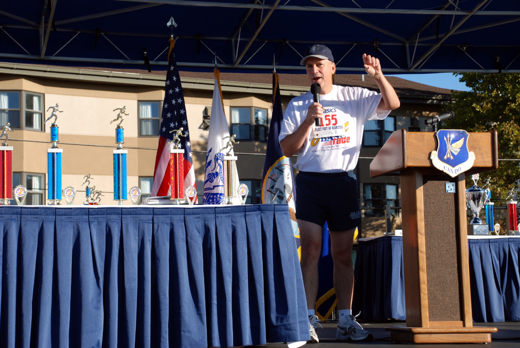 Col. Rick Martin, 305th Air Mobility Wing commander, gave the opening remarks at the McGuire-Dix-Lakehurst Joint Base Race here Sept. 29. Colonel Martin participated in the 5K Fun Run/Walk, placing third in his age category. (U.S. Air Force photo/Airman 1st Class Rebekah Phy)