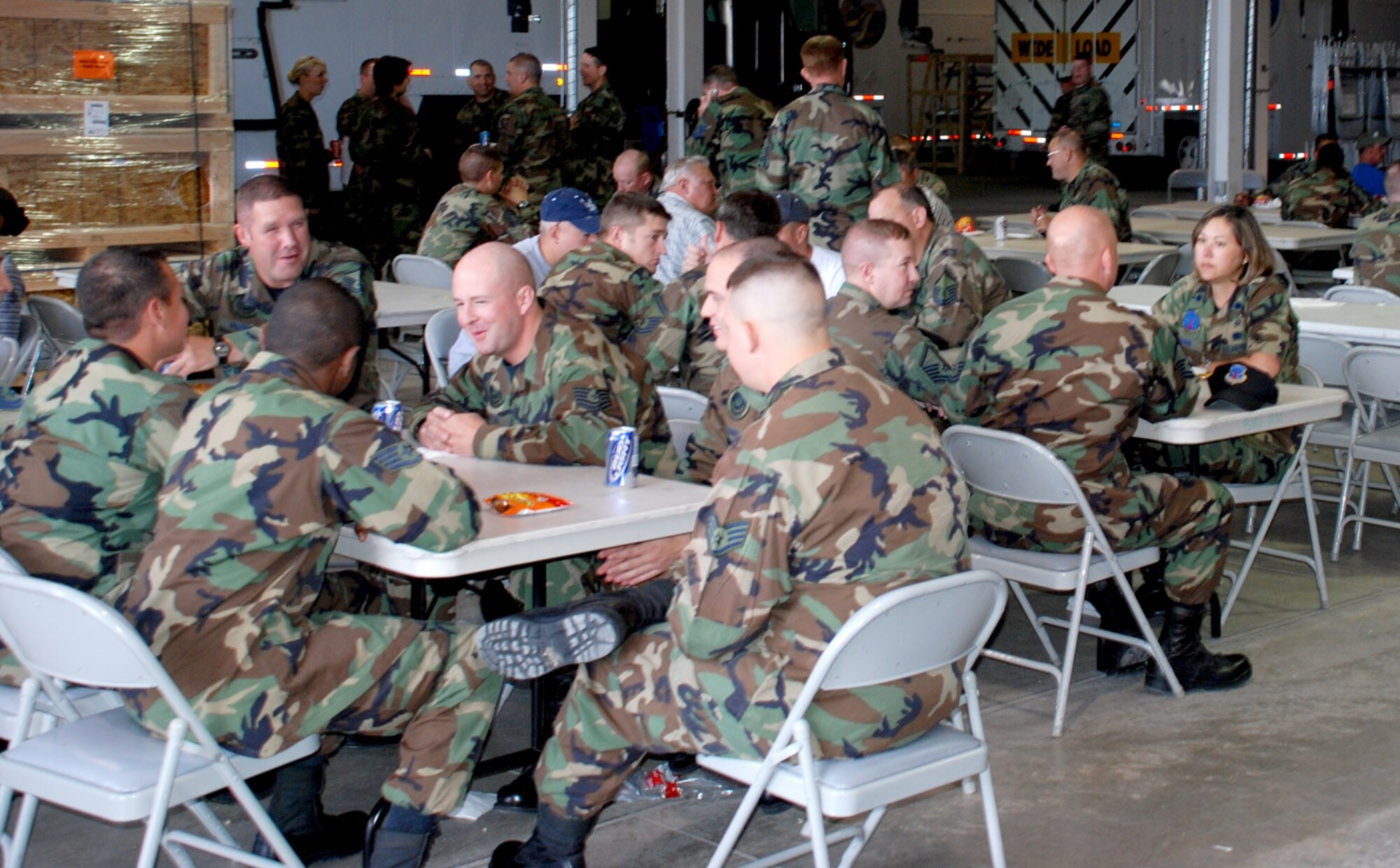 Members of the 90th Maintenance Group barbecued during lunch after the IG out briefing Sept. 20. The base received an ‘excellent’ overall score and many of Warren’s members celebrated the victory with a hearty meal (Photo by Airman 1st Class Daryl Knee).