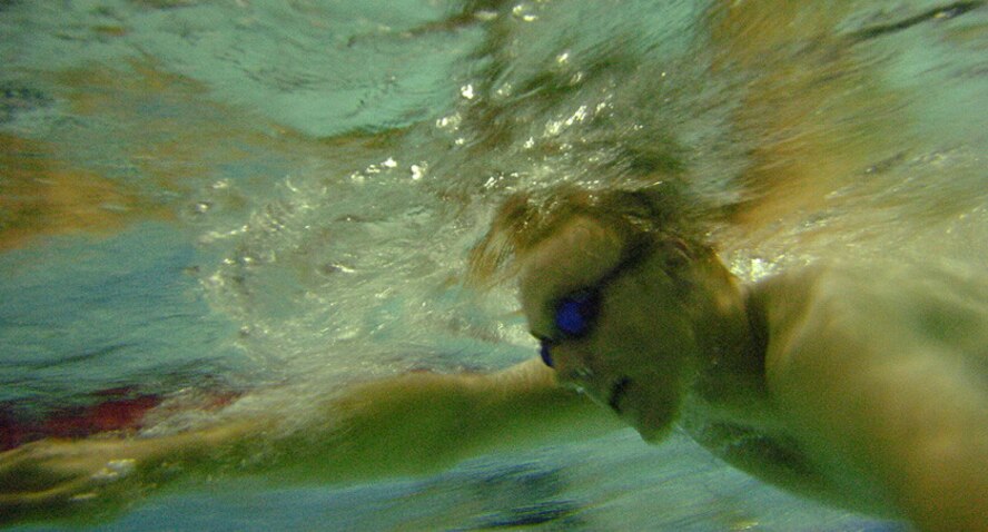 Airman 1st Class Seth Novak competed at this year's United States Air Forces in Europe international swim competition placing first in the 50-meter freestyle, second in the 100-meter freestyle and first in a 4-by-100-meter freestyle. (U.S. Air Force photo by Tech. Sgt. Jeremy Lock) 

