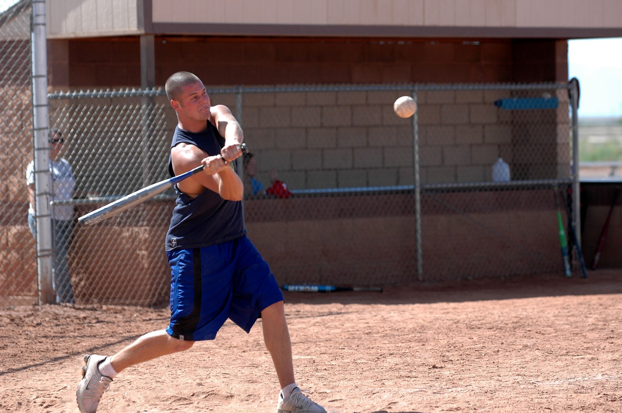 Airman 1st Class Ryan Bellamy, 49th Aircraft Maintenance Squadron hits the ball during a softball game between 49 AMXS and the 49th Operations Support Squadron. 49 AMXS beat 49 OSS 10-9. (U.S. Air Force photo/Airman 1st Class Heather Stanton)