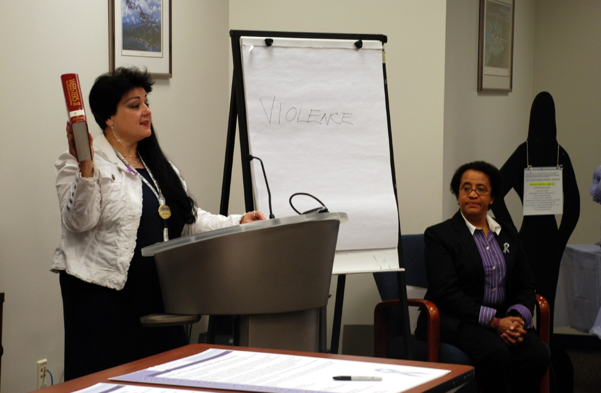 Mimi Cirillo, McGuire library director, speaks during the Domestic Violence Proclamation signing here Oct. 1. Ms. Cirillo shared her personal story about domestic violence in hopes of encouraging others to seek help. (U.S. Air Force photo/Airman 1st Class Rebekah Phy) 