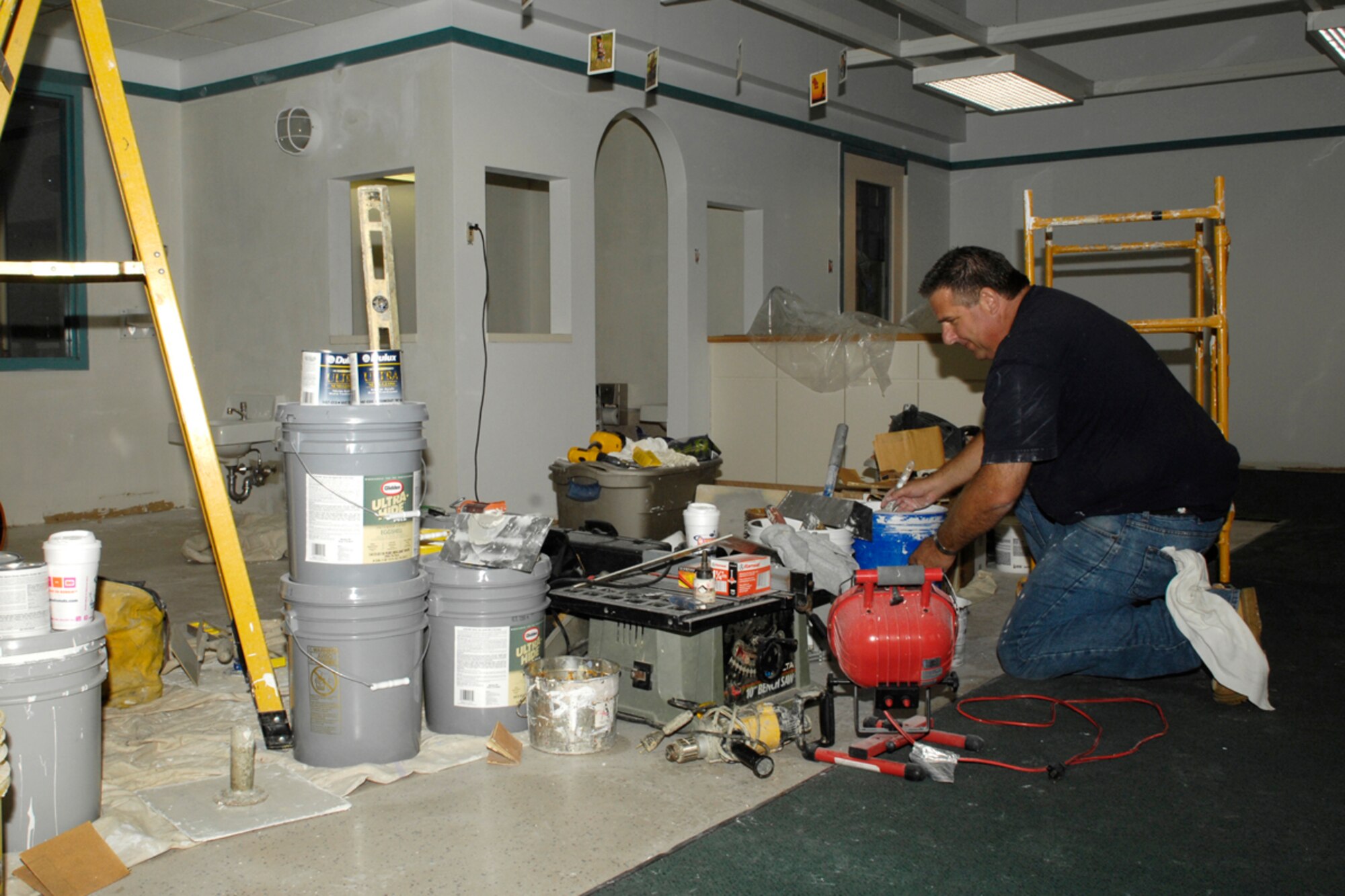 HANSCOM AFB, Mass. -- Contractor Bruce Richard works to renovate a classroom in the Child Development Center as part of a $1.2 million construction project that will expand the center's capacity Sept. 25. The renovation will increase the center's capacity for children ages 6 weeks to 2 years by more than 25 percent.The project is expected to be completed by January 2008. (U.S. Air Force photo by Linda LaBonte Britt)