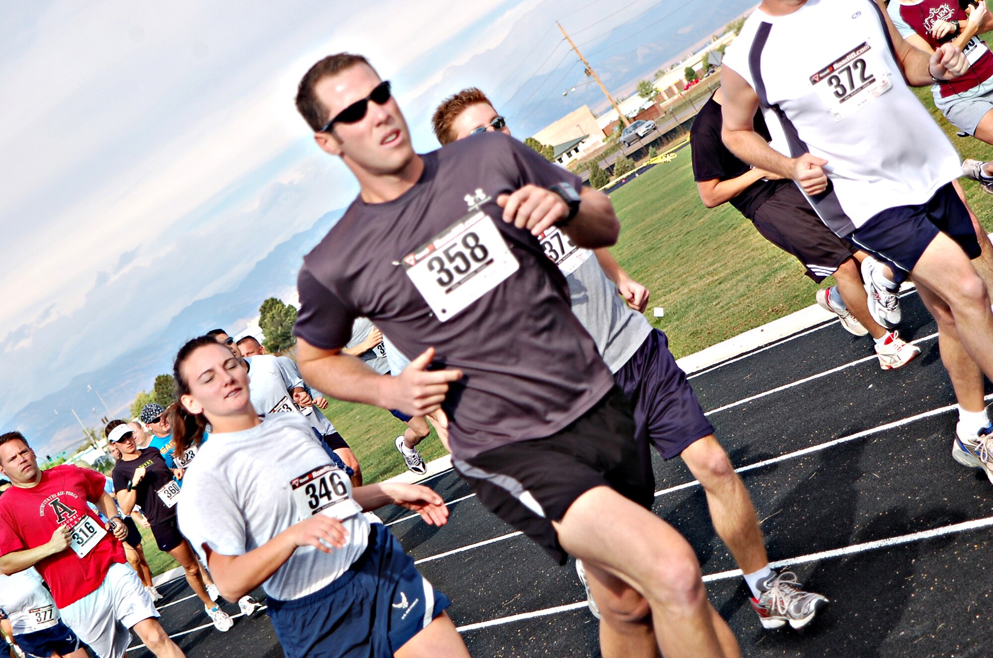 BUCKLEY AIR FORCE BASE, Colo. -- Staff Sgt. Brendan Crawford, from the 566th Information Operations Squadron, runs in Buckley's 10k Panther Challenge Sept. 29. The Panther Challenge raised $1,388 donations for Hearts Across the Miles as well as large amounts of goods for care packages to send to deployed troops. Capt. Kevin Eastler, from the 566th Information Operations Squadron, won in the men's division with a time of 40:49. (U.S. Air Force photo by Senior Airman Jacque Lickteig)
