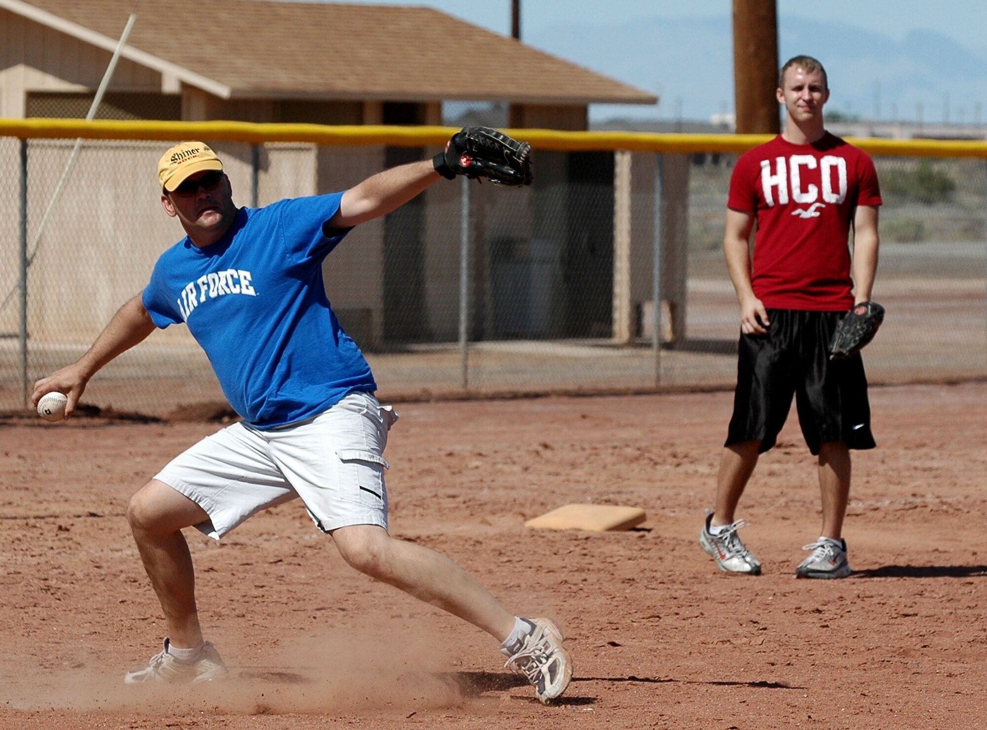The 49th Logistics Readiness Squadron slid passed the Ammunitions flight 12-11 during the Sports Day one-pitch softball tournament Sept. 26. (U.S. Air Force photo/Airman 1st Class Heather Stanton)