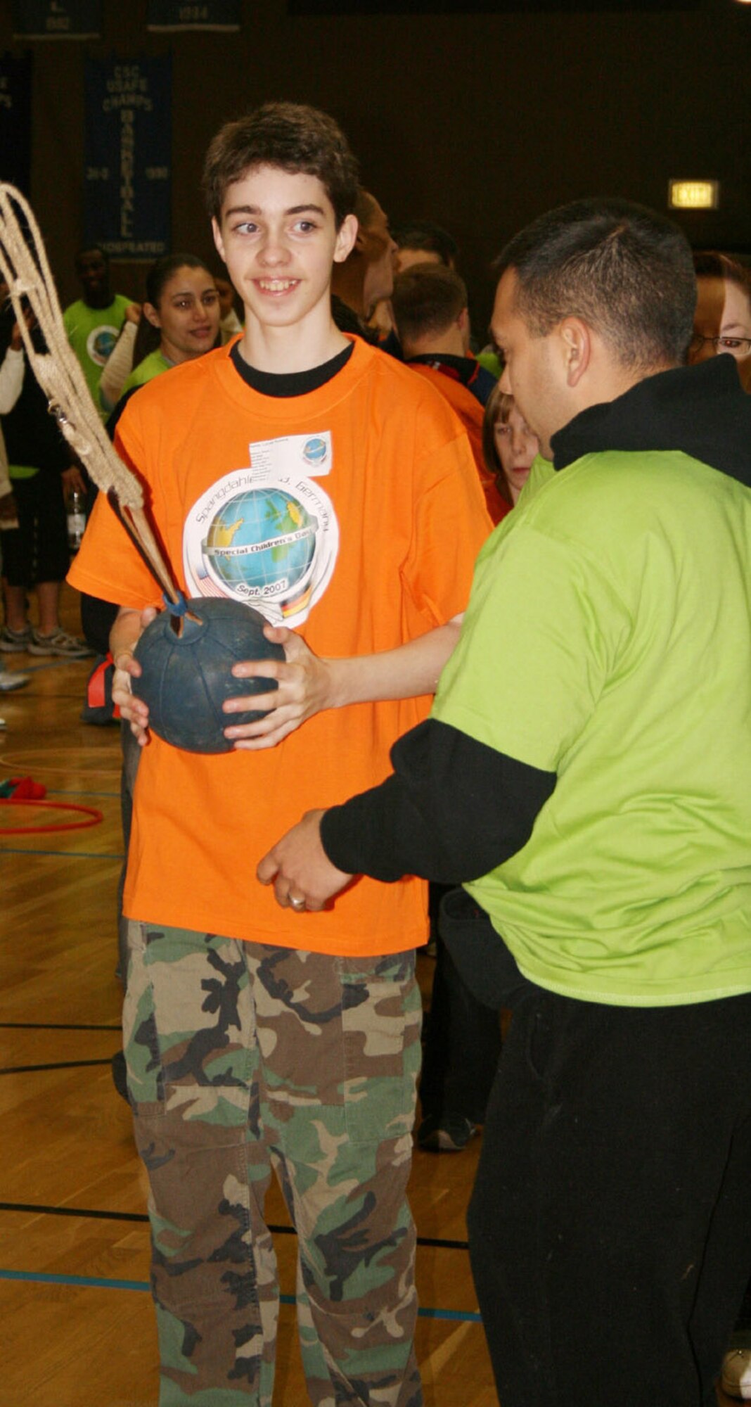 SPANGDAHLEM AIR BASE, Germany -- Lukas Rusack, Department of Defense student and son of Marye and Tech. Sgt. Todd Rusack, 52nd Equipment Maintenance Squadron, participates in the rope bowling during Special Children’s Day, a day for special needs students from Bitburg’s St. Martin’s School and local DoD schools Sept. 20. (Courtesy photo)