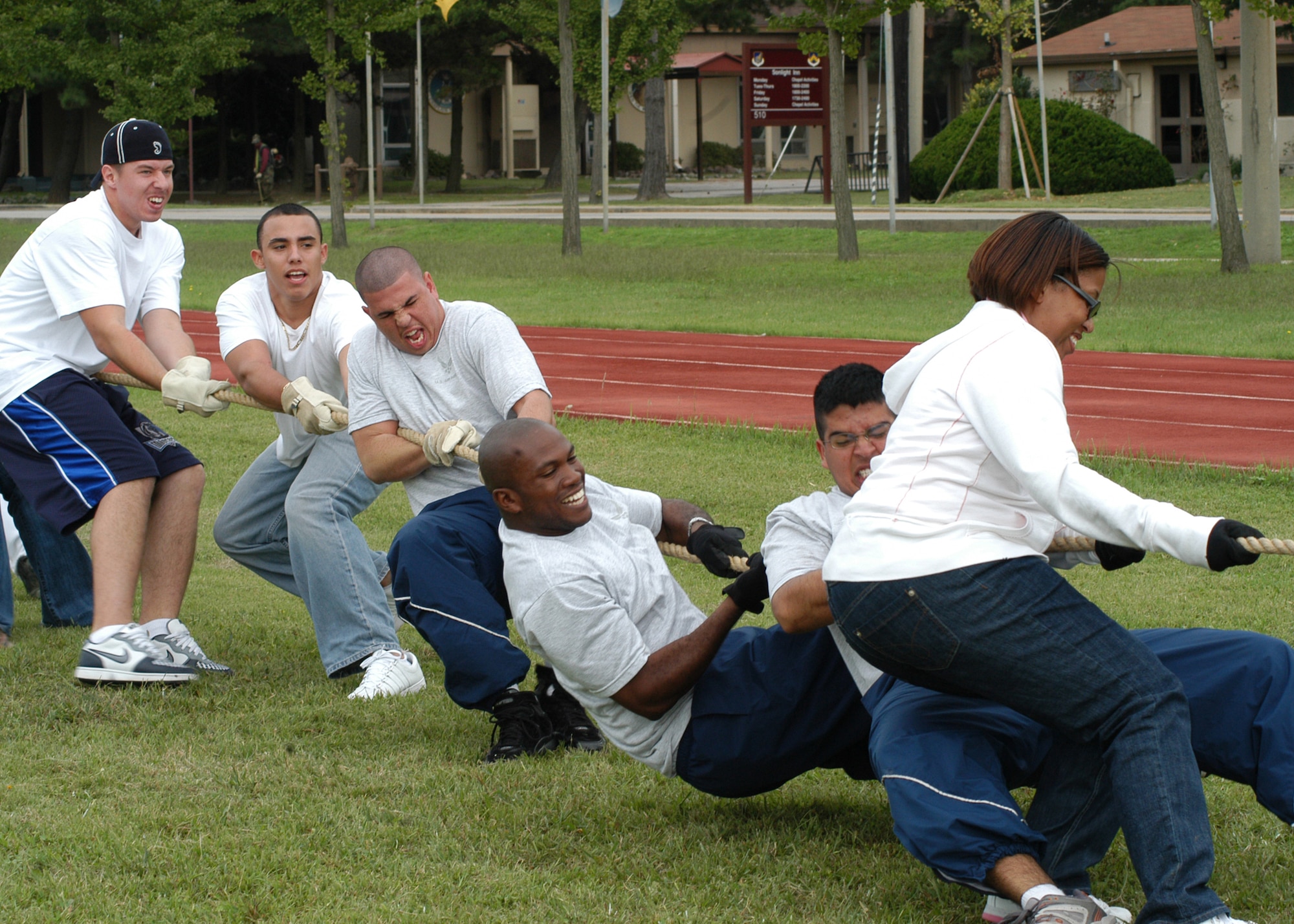 KUNSAN AIR BASE, South Korea – Airmen of the 8th Logistic Readiness Squadron pull with all there strength during the tug-of-war contest against 8th Fighter Wing staff Sept. 28 here. The 8th Logistic Readiness Squadron Airmen along with others participated in a number of events during the 8th Fighter Wing Sports Day. The sports day allows Airmen a way to compete in friendly and fun competitions, helping to build esprit de corps. The day kicked off with a wing run and events, ranging from a Texas Hold ‘Em tournament to unit paintball challenges. (U.S. Air Force photo/Staff Sergeant Araceli Alarcon)                                