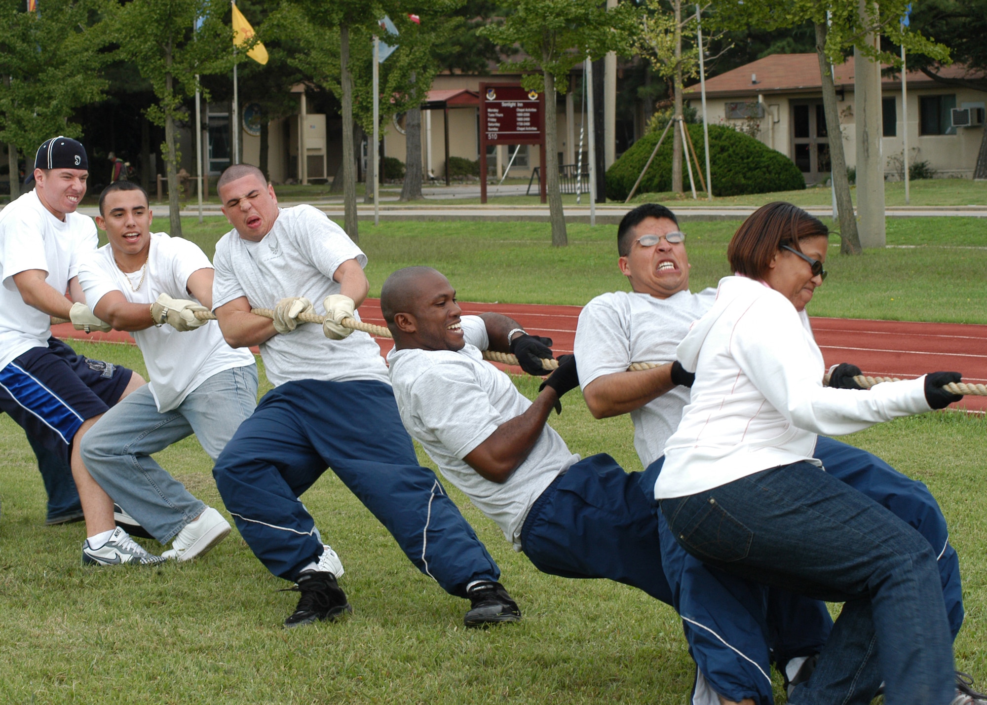 KUNSAN AIR BASE, South Korea – Airmen of the 8th Logistic Readiness Squadron pull with all there strength during the tug-of-war contest against 8th Fighter Wing staff Sept. 28 here. The 8th Logistic Readiness Squadron Airmen along with others participated in a number of events during the 8th Fighter Wing Sports Day. The sports day allows Airmen a way to compete in friendly and fun competitions, helping to build esprit de corps. The day kicked off with a wing run and events, ranging from a Texas Hold ‘Em tournament to unit paintball challenges. (U.S. Air Force photo/Staff Sergeant Araceli Alarcon)                                