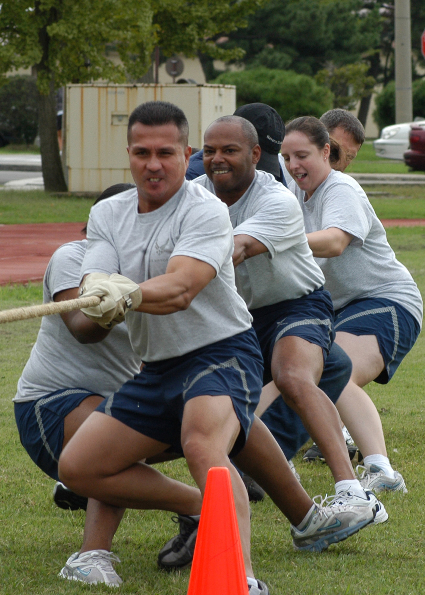 KUNSAN AIR BASE, South Korea – Airmen of the 8th Mission Support Group pull with all there strength during the tug-of-war contest against 8th Logistic Readiness Squadron Airmen Sept. 28 here. The 8th Mission Support Group Airmen  along with others participated in a number of events during the 8th Fighter Wing Sports Day. The sports day allows Airmen a way to compete in friendly and fun competitions, helping to build esprit de corps. The day kicked off with a wing run and events, ranging from a Texas Hold ‘Em tournament to unit paintball challenges. (U.S. Air Force photo/Staff Sergeant Araceli Alarcon)                                