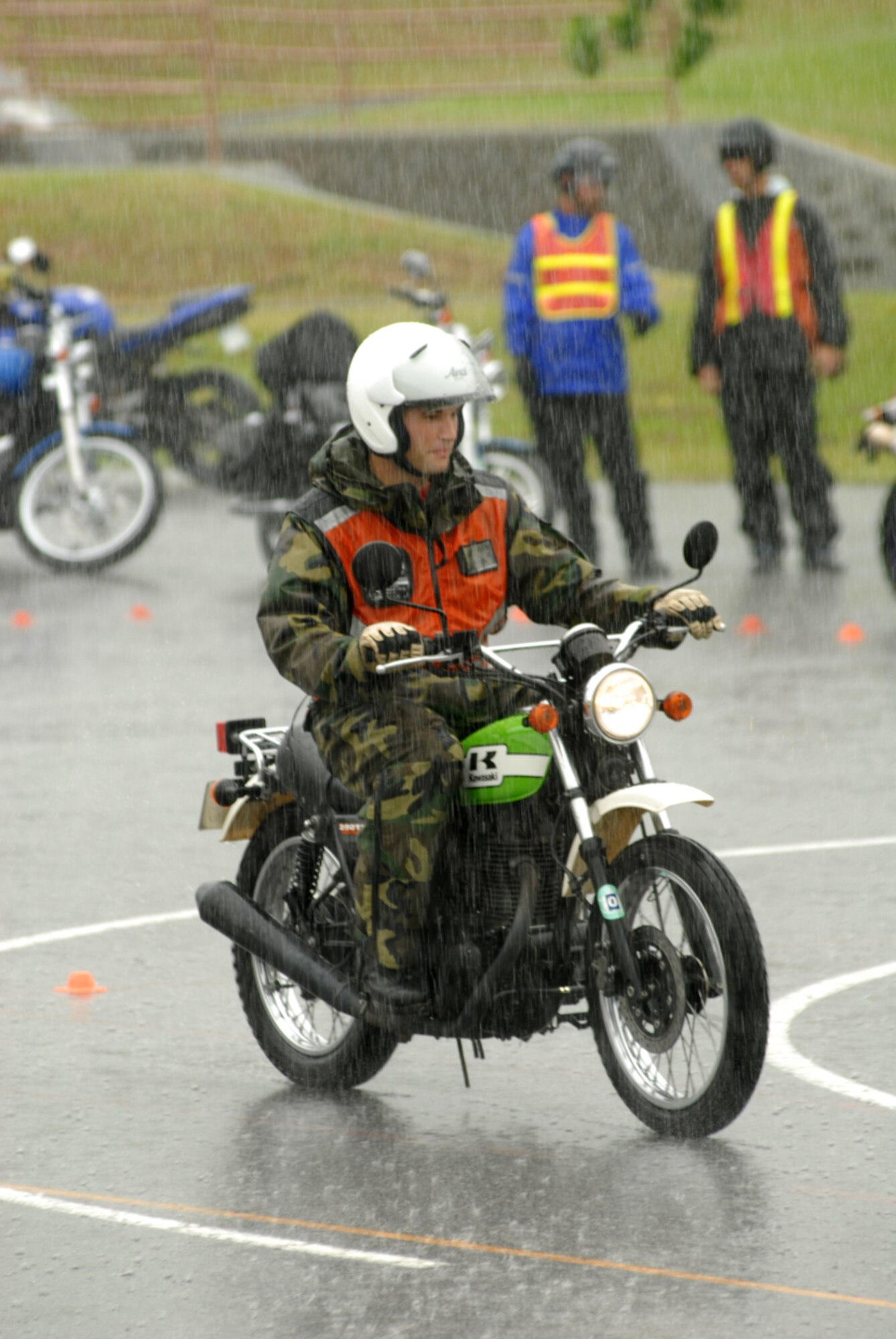 Capt. Mark Lennon, 909th Air Refueling Squadron, rides his motorcycle through the safety course during the 18th Wing’s motorcycle all-call Sept. 21.
(U.S. Air Force photo/Airman 1st Class Kasey Zickmund)