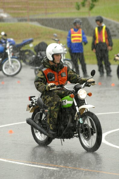 Capt. Mark Lennon, 909th Air Refueling Squadron, rides his motorcycle through the safety course during the 18th Wing’s motorcycle all-call Sept. 21.
(U.S. Air Force photo/Airman 1st Class Kasey Zickmund)
