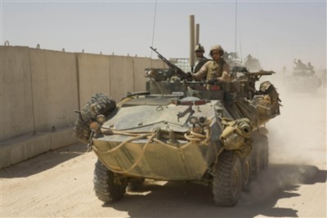 U.S. Marines from Light Armored Reconnaissance Battalion leave Camp Korean Village, Iraq, on Sept. 10, 2007.  The Marines are deployed with Multi-National Forces - West in the Al Anbar province of Iraq.  