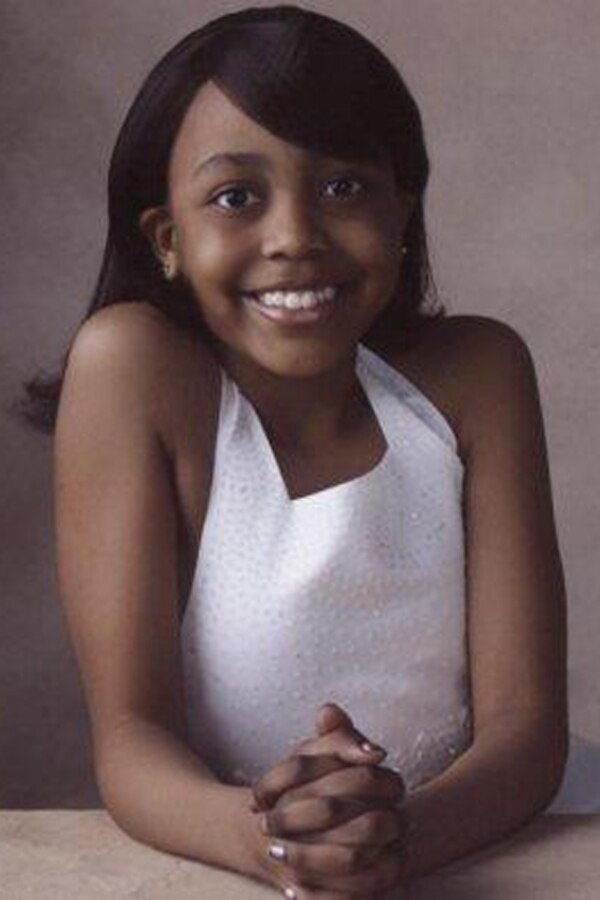 Briana Menendez poses at age 11.