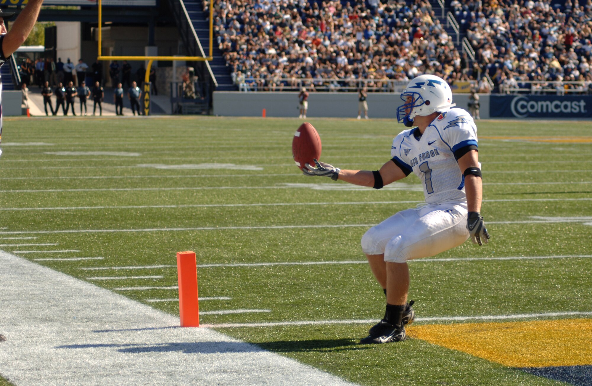 U.S. Air Force Academy Falcon receiver Chad Hall flips the ball to an official after scoring on an end around play in the third quarter of Air Force's 31-20 loss to Navy Sept. 29 at Annapolis, Md. The senior carried six times for 29 yards. (U.S. Air Force photo/Capt. Jillian Torango) 

