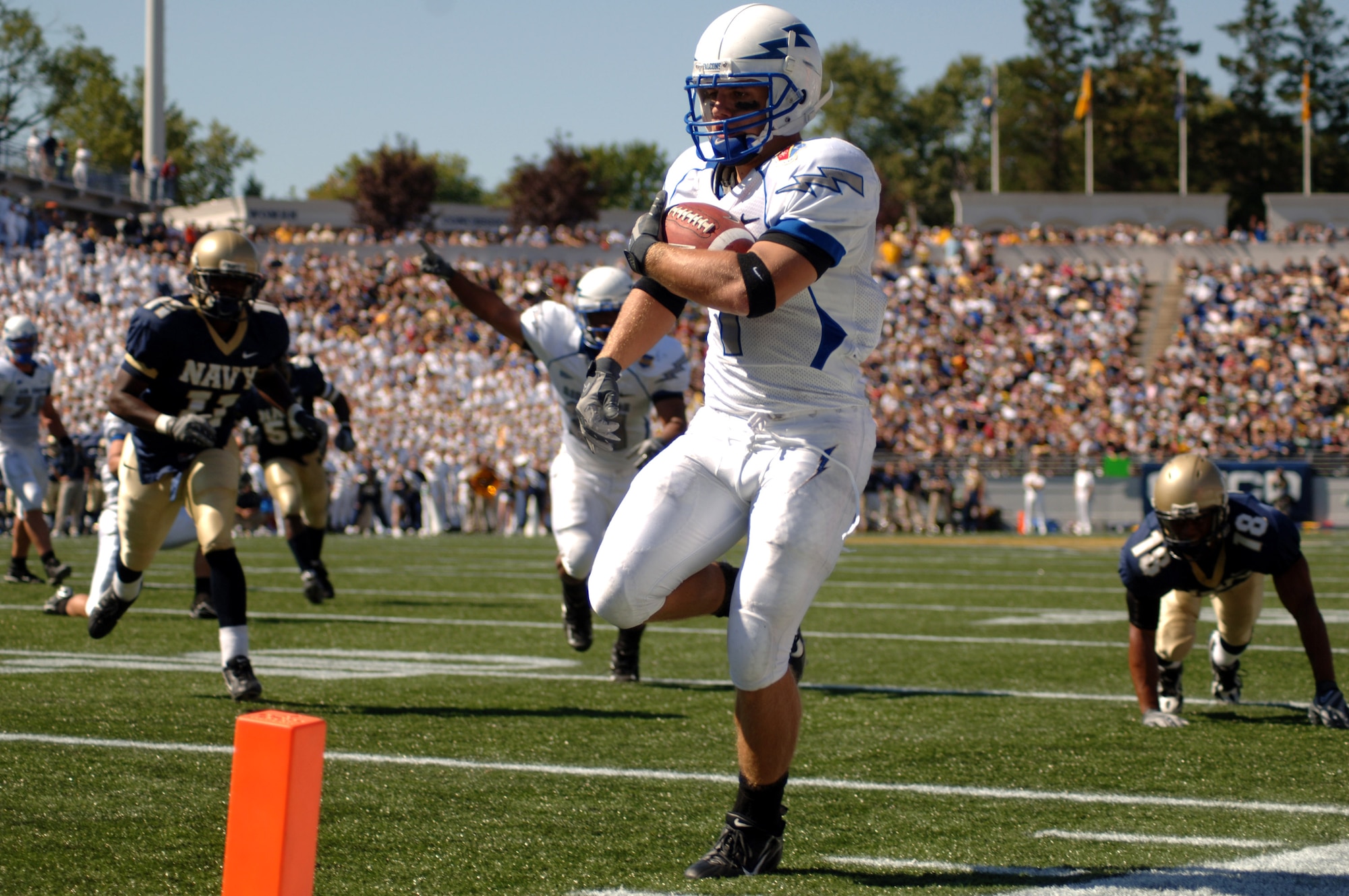 U.S. Air Force Academy Falcon senior Chad Hall high steps into the end zone at the end of his 16-yard touchdown run in the second quarter of Air Force's 31-20 loss to Navy Sept. 29 at Annapolis, Md. Hall also caught a game-high eight passes for 108 yards. (U.S. Air Force photo/Capt. Jillian Torango) 
